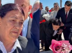 E shoqëruar nga Luani i ri, nëna Rukë vendos lule mbi varrin e Luanit në 29-vjetorin e rënies së tij